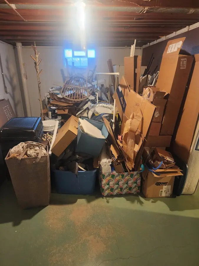 Roll-off dumpster container at job site for 2 Yard Dumpster Rental in Ben Lomond